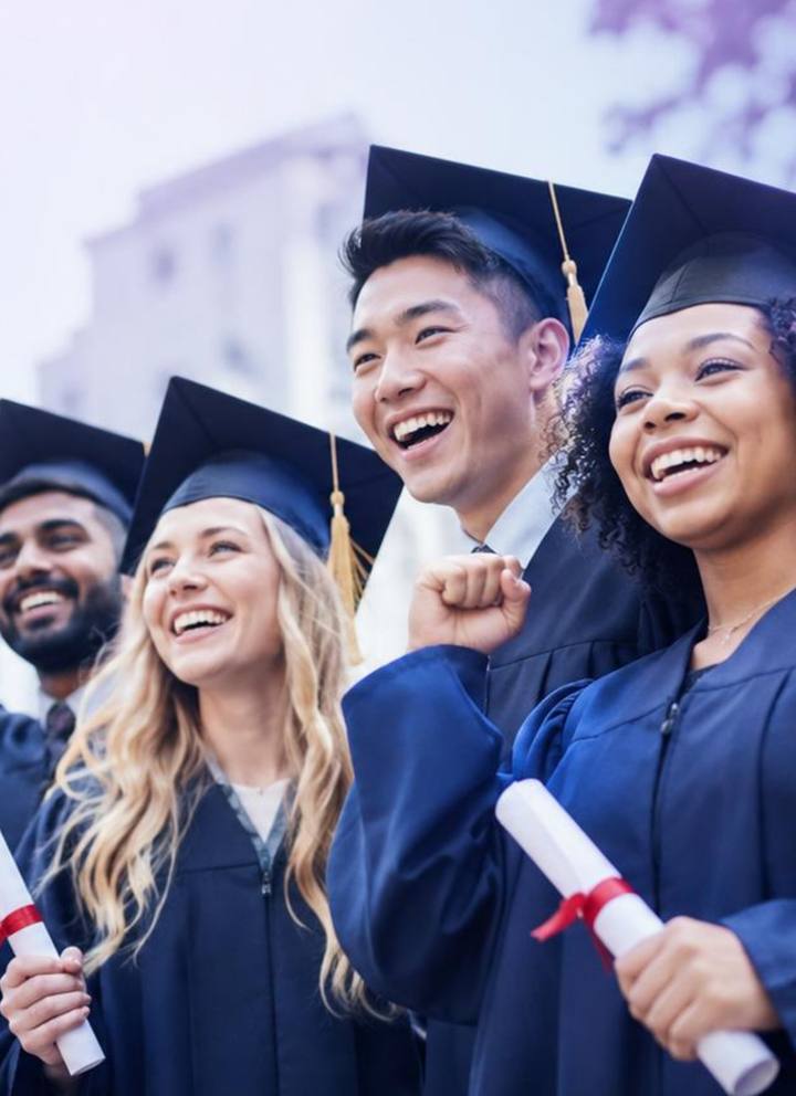 Students celebrating at graduation